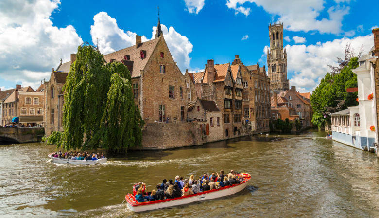 Cruise on the canal of Bruges in summer time