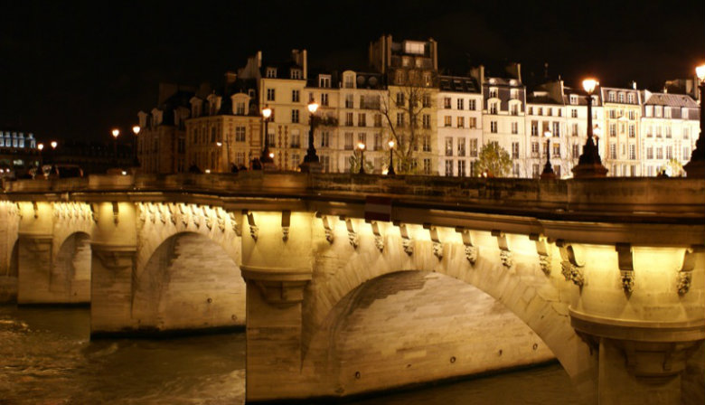 Iluminated bridge over the Seine river at night