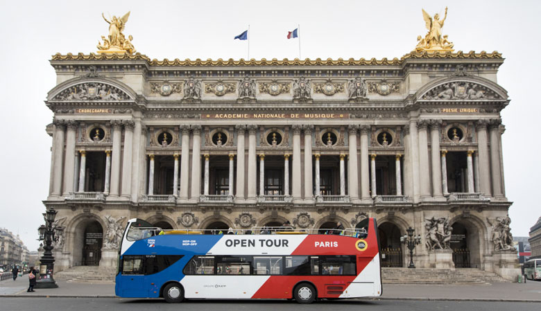 The Opentour bus in front of the Opera Garnier